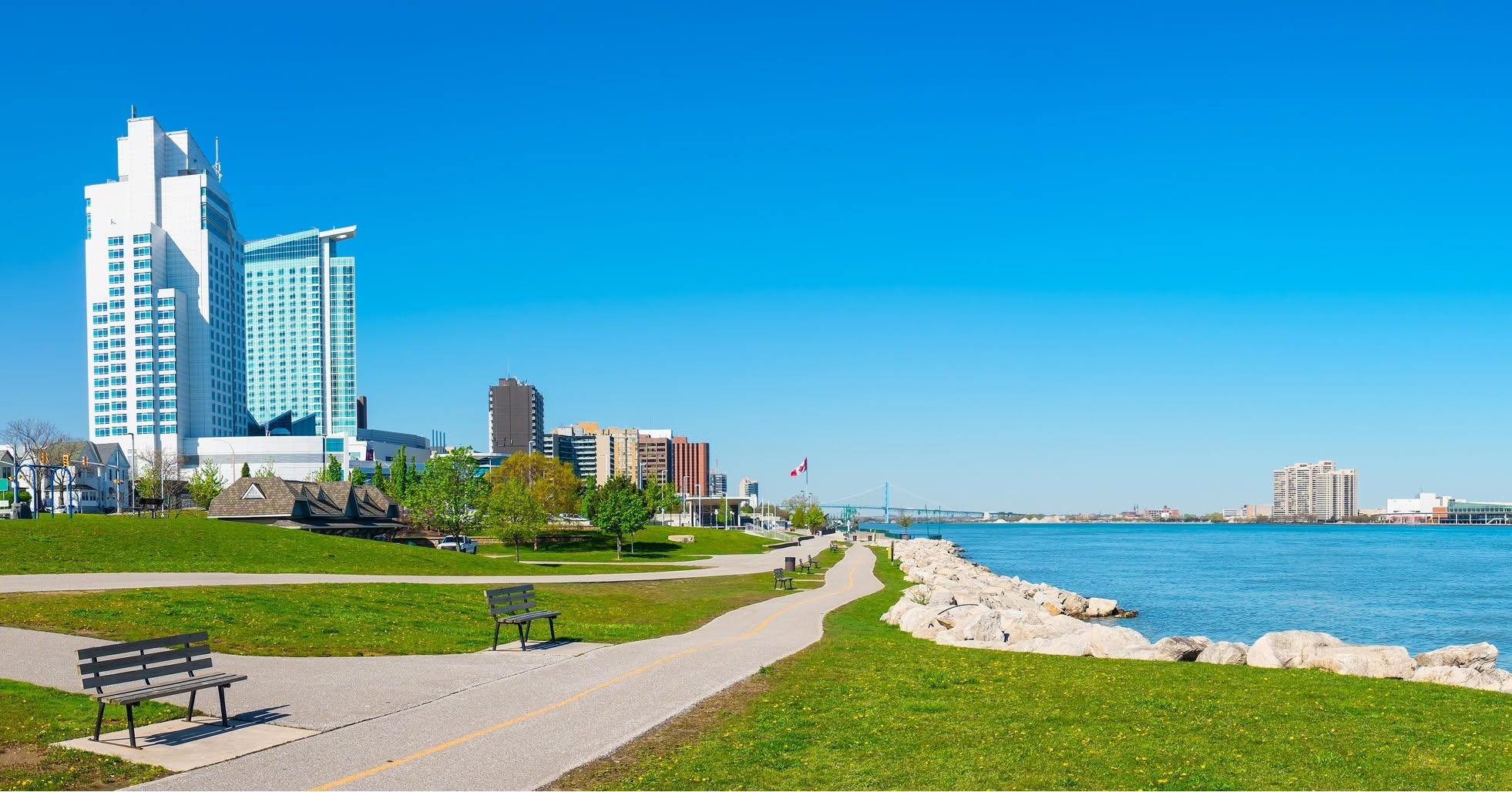 Windsor's riverfront park, waterfront path and skyline beside the Detroit River.